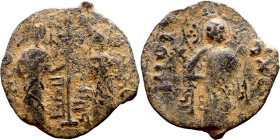 Seljuk (1037–1157, bronze coin in Byzantine style. Obverse: Two figures Reverse: standing figure