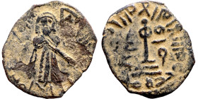 al-Malik ibn Marwan (687-705) Follis. Obverse: Imperial figure. Reverse: Modified cross potent set on steps