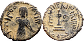 al-Malik ibn Marwan (687-705) Follis. Obverse: Imperial figure. Reverse: Modified cross potent set on steps