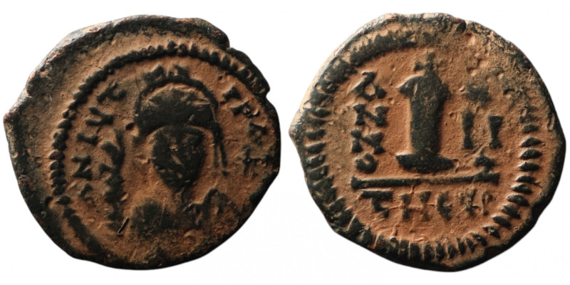 Justinian I (AD 527-565). Theoupolis (Antioch)
AE Decanummium (21mm, 3,56g)

Art...