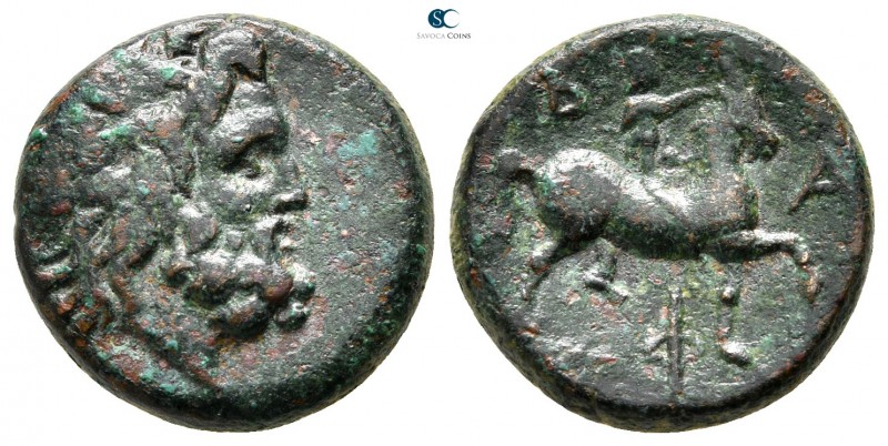 Kings of Macedon. Pella or Amphipolis. Philip V. 221-179 BC. 
Bronze Æ

19mm....