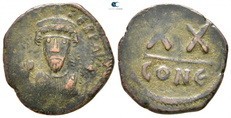 Phocas AD 602-610. Constantinople
Half follis Æ

22mm., 4,30g.



very fi...