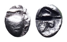 Greek Obol AR Reference: Condition: Very Fine

Weight: 0.58 gr. Diameter: 7.7 mm