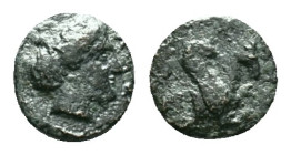 Greek Coins. 4th - 3rd century B.C. AE Reference: Condition: Very Fine

Weight:1.25 gr. Diameter: 10.1 mm