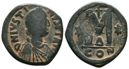 Justinian I the Great (AD 527-565). Æ follis. Reference : "Repatinated" Condition: Very Fine

Weight:15.5 gr. Diameter: 30.3 mm