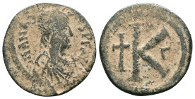 Justinian I the Great (AD 527-565). Æ follis. Reference : "Repatinated" Condition: Very Fine

Weight:7.99 gr. Diameter: 27.5 mm