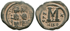 JUSTIN II, with SOPHIA (565-578). Follis. Reference : "Repatinated" Condition: Very Fine

Weight: 12.7 gr. Diameter: 31.0 mm