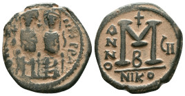 JUSTIN II, with SOPHIA (565-578). Follis. Reference : "Repatinated" Condition: Very Fine

Weight: 12.2 gr. Diameter: 28.4 mm