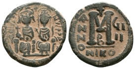 JUSTIN II, with SOPHIA (565-578). Follis. Reference : "Repatinated" Condition: Very Fine

Weight: 12.7 gr. Diameter: 27.0 mm