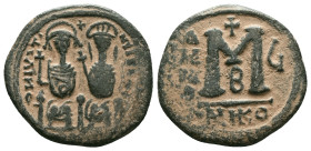 JUSTIN II, with SOPHIA (565-578). Follis. Reference : "Repatinated" Condition: Very Fine

Weight: 9.63 gr. Diameter: 26.5 mm