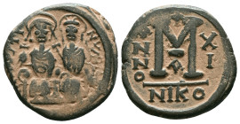 JUSTIN II, with SOPHIA (565-578). Follis. Reference : "Repatinated" Condition: Very Fine

Weight: 12.6 gr. Diameter: 26.5 mm