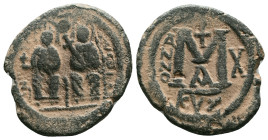 JUSTIN II, with SOPHIA (565-578). Follis. Reference : "Repatinated" Condition: Very Fine

Weight: 10.7 gr. Diameter: 27.1 mm