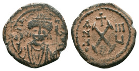 Byzantine Coins AE, 7th - 13th Centuries Reference : "Repatinated" Condition: Very Fine

Weight: 3.0 gr. Diameter:18.0 mm