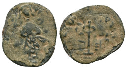 Byzantine & Arab Coins AE, 7th - 13th Centuries Reference: Condition: Very Fine

Weight: 1.19 gr. Diameter: 18.4 mm
