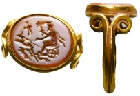 A roman carnelian intaglio mounted in a gold ring. Warior scene. Probably Zeus on Biga was pulled by Snakes. 1st - 2nd century A.D.

Reference: Cond...