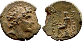 Antiochos III The Great (Seleukid King: 223-187 BC). AE bronze. Obv.: Laureate head of Apollo Rev.: Apollo seated left on omphalos, testing arrow and ...