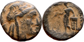 Seleukos II Kalinikos (Seleukid King: 246 - 226 BC) AE bronze. Obv Obv.: : Diademed head of Seleucus II right Reverse: Apollo standing left, testing a...