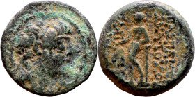 Antiochos III The Great (Seleukid King: 223-187 BC). AE bronze. Obv.: Laureate head of Apollo Rev.: Apollo seated left on omphalos, testing arrow and ...