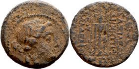 Seleukos II Kalinikos (Seleukid King: 246 - 226 BC) AE bronze. Obv: Laureate head of Apollo right, with wavy locks Rev: Tripod