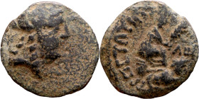 Hellenistic period coin (4-1 century BC) AE Bronze.  Obv: Bust of Apollo. Rev: Seated Tyche