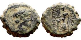 Antiochos III The Great (Seleukid King: 223-187 BC). AE bronze. Obv.: Laureate head of Apollo Rev.: Apollo seated left on omphalos, testing arrow and ...