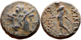 Antiochos III The Great (Seleukid King: 223-187 BC). AE bronze. Obv.: Laureate head of Apollo Rev.: Apollo seated left on omphalos, testing arrow and ...