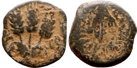 JUDAEA. Jerusalem mint. Agrippa I (under Claudius, 37-44 AD). AE prutah. Obv.: ΒΑCΙΛΕWC ΑΓΡΙΠΑ; Umbrella-like canopy with fringes. Rev.: Three ears of...