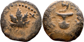 JUDAEA. Jerusalem mint. First Jewish Revolt (66-70 AD). AE prutah. Obv.: Two handled amphora. Rev.: vine leaf on small branch, bears the legend "for t...