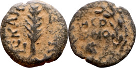 JUDAEA. Jerusalem mint. Porcius Festus (time of Nero, 59-62 AD). Bronze Prutah. Obv.: Palm-branch surrounded by L C•KAIC-APOC. Rev.: NEP • ωNO • C in ...