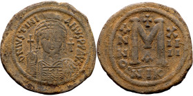 Justinian I (527-656) Follis. Obverse: DN IVSTINIANVS PP AVG, Armoured facing bust holding globus Reverse: Large M between ANNO and regnal year
