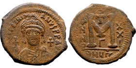 Justinian I (527-656) Follis. Obverse: DN IVSTINIANVS PP AVG, Armoured facing bust holding globus Reverse: Large M between ANNO and regnal year