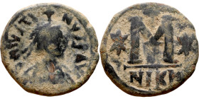 Justin I (518-527) Follis Obverse: :D N IVSTINVS PP AVG, diademed, draped, and cuirassed bust right Reverse: Large M