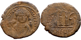 Maurice Tiberius (582-602) Follis. Antioch. Obverse: Crowned bust facing, wearing consular robes, holding mappa and eagle-tipped scepter , Reverse: La...