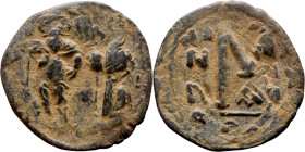 Heraclius and Hercalius. Constantine (610-641) Follis. Obverse: Heraclius on left, Heraclius Constaninte on right, . Reverse: ANNO, Large M, cross abo...