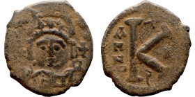 Maurice Tiberius (582-602) Half Follis. Obverse: Helmeted and cuirassed bust facing, holding globus cruciger and shield., Reverse: Large K above cross...