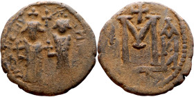 Heraclius and Hercalius. Constantine (610-641) Follis. Obverse: Heraclius on left, Heraclius Constaninte on right, . Reverse: ANNO, Large M, cross abo...