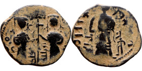 Seljuk (1037–1157, bronze coin in Byzantine style. Obverse: Two figures Reverse: standing figure