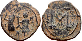 Heraclius and Hercalius. Constantine (610-641) Follis. Obverse: Heraclius on left, Heraclius Constaninte on right, . Reverse: ANNO, Large M, cross abo...