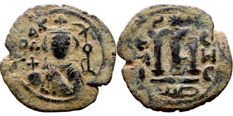 al-Malik ibn Marwan (687-705), Constans II style folis Obverse: Imperial figure ...