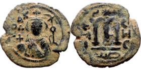 al-Malik ibn Marwan (687-705), Constans II style folis Obverse: Imperial figure holding globus Reverse: m and inscription