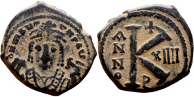 Maurice Tiberius (582-602) Half Follis. Antioch. Obverse: Crowned bust facing, wearing consular robes, holding mappa and eagle-tipped scepter , Revers...