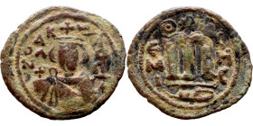 al-Malik ibn Marwan (687-705), Constans II style folis Obverse: Imperial figure holding globus Reverse: m and inscription