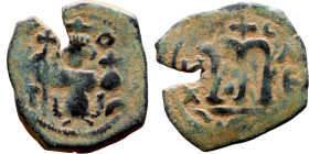 al-Malik ibn Marwan (687-705), Constans II style folis Obverse: Imperial figure holding globus Reverse: m and inscription