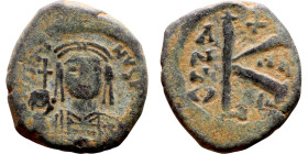 Maurice Tiberius (582-602) Half Follis. Obverse: Helmeted and cuirassed bust facing, holding globus cruciger and shield., Reverse: Large K above cross...