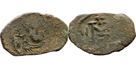 Constans II (641-668) Follis. Obverse: Imperial figure holding cross and globus Reverse: m and inscription