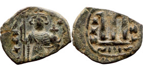 Constans II (641-668) Follis. Obverse: Imperial figure holding cross and globus Reverse: m and inscription