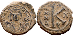 Maurice Tiberius (582-602) Half Follis. Antioch. Obverse: Crowned bust facing, wearing consular robes, holding mappa and eagle-tipped scepter , Revers...