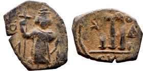 al-Malik ibn Marwan (687-705), Constans II style folis Obverse: Imperial figure holding globus Reverse: m and inscription