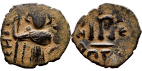 al-Malik ibn Marwan (687-705), Constans II style folis Obverse: Imperial figure holding globus Reverse: m and inscription