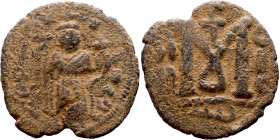 al-Malik ibn Marwan (687-705), Constans II style folis Obverse: Imperial figure holding globus Reverse: m and inscription